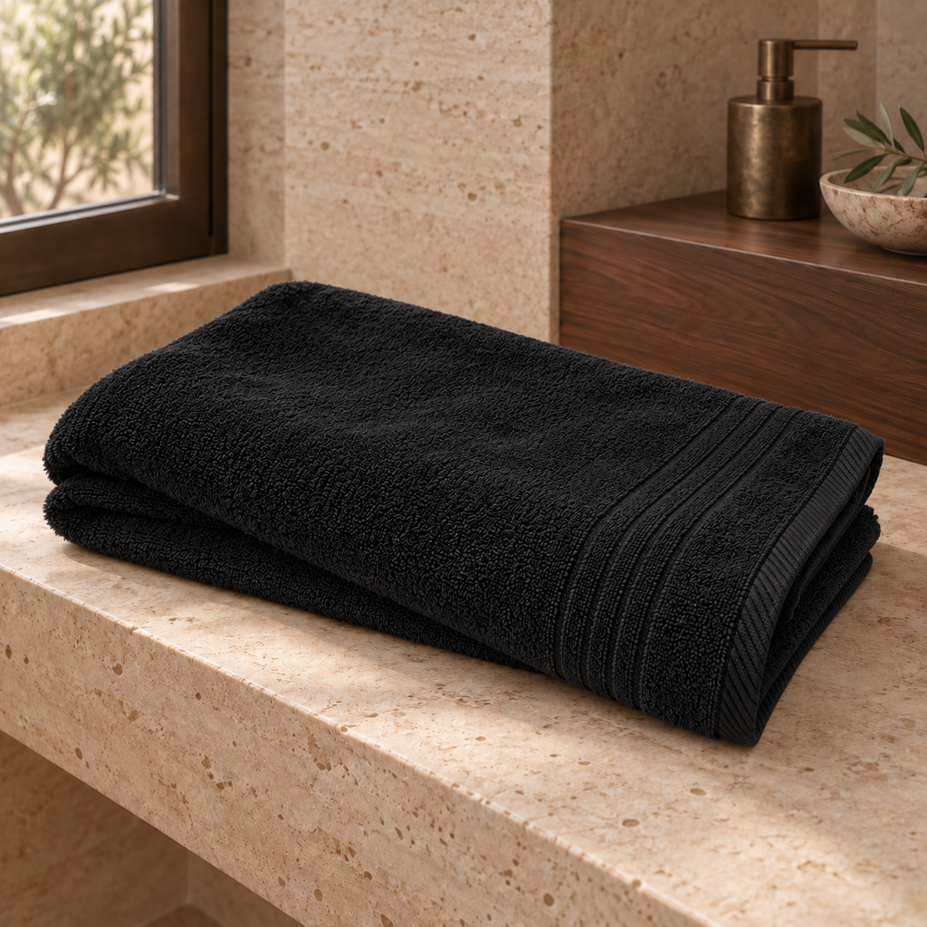 Essential 550 GSM Bath Towel 70x140 cm in Black - Hero Angle