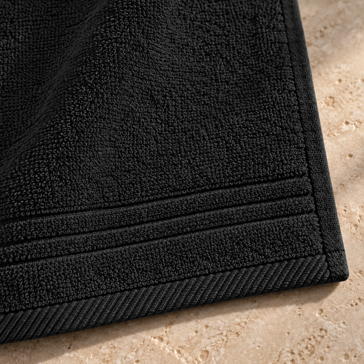 Essential 550 GSM Face Towel 30x30 cm in Black - Closeup Border