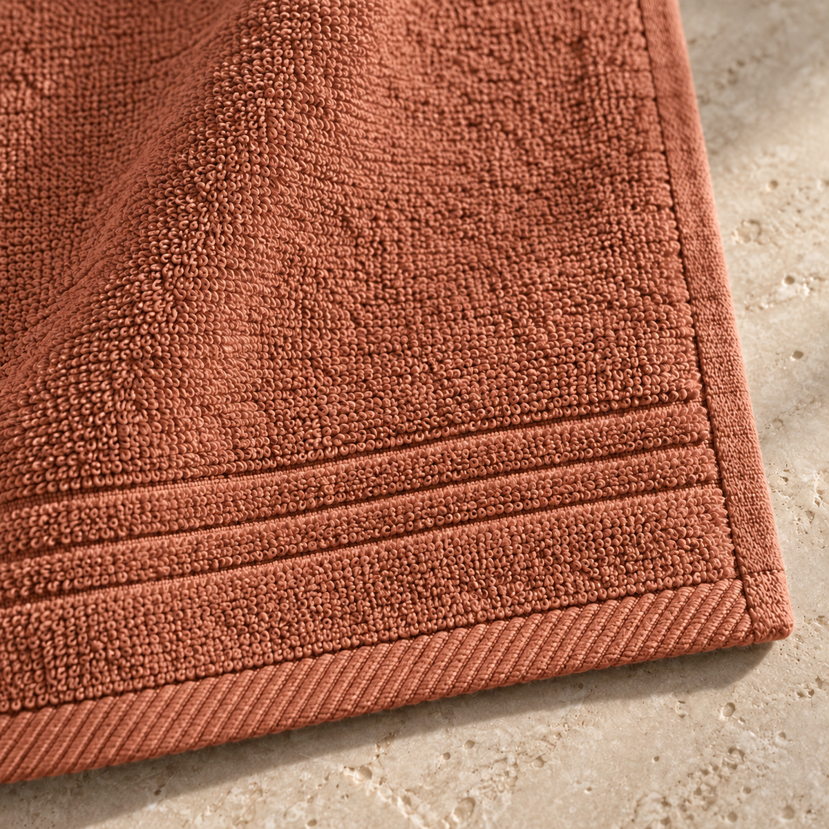 Essential 550 GSM Face Towel 30x30 cm in Terra Cotta - Closeup Border